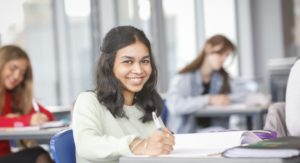 Smiling Girl Studying